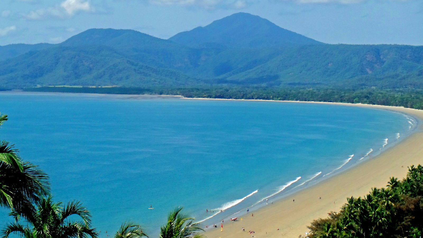 Rondreis Australië, Port Douglas, strand met blauw water