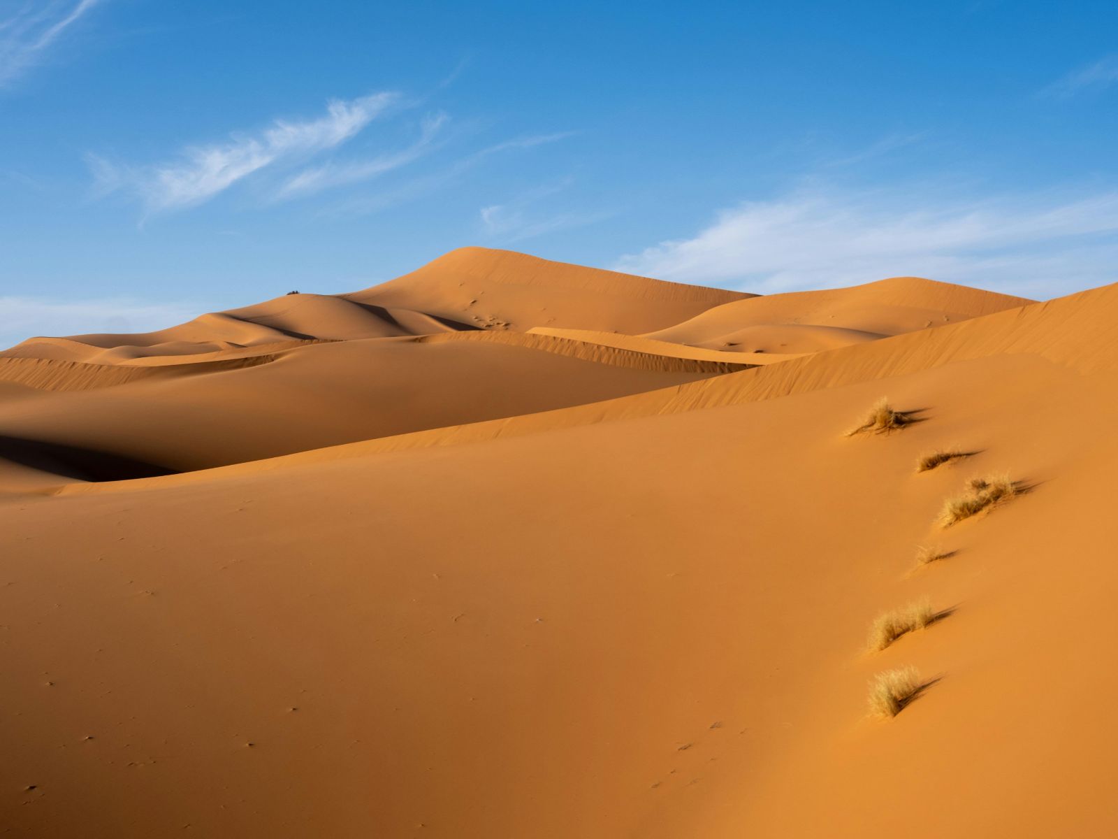 Rondreis Marokko, Erg Chegaga, woestijnen met de zon erop