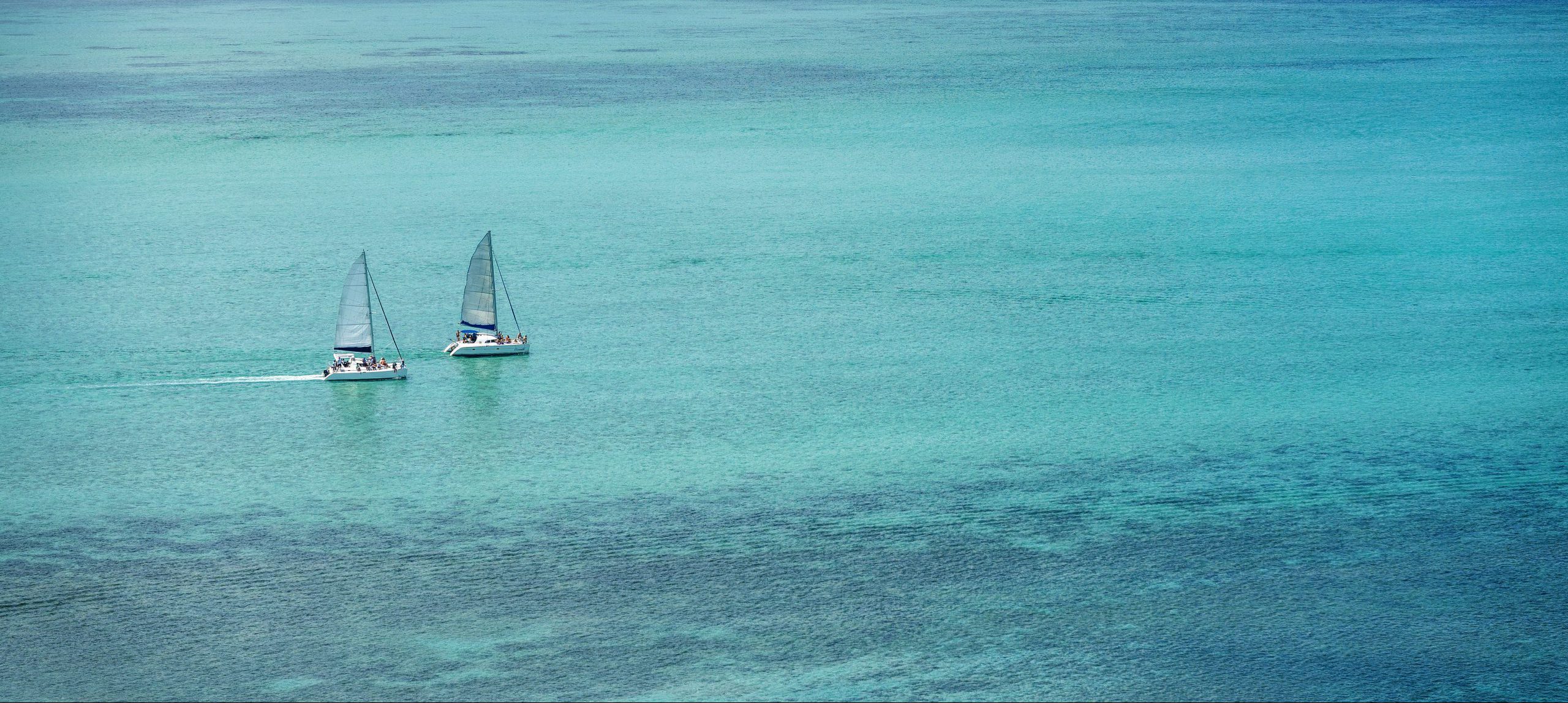 Rondreis Mauritius, catamarans op het water banner
