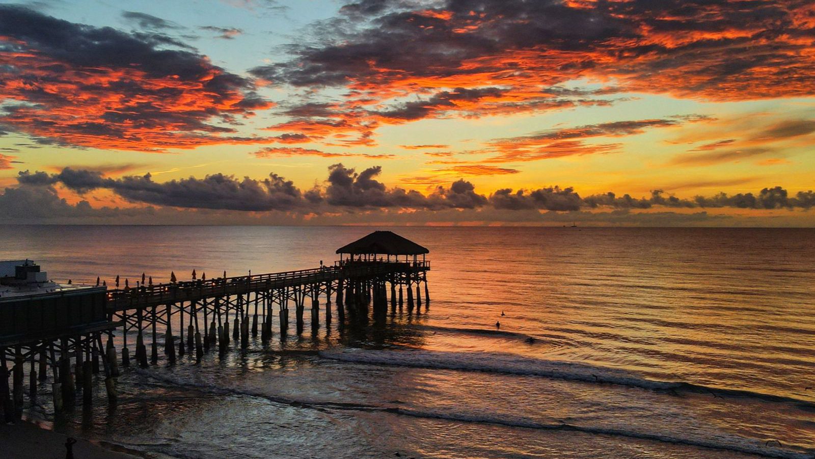 Rondreis Amerika, Cocoa Beach, Pier met zonsondergang in zee