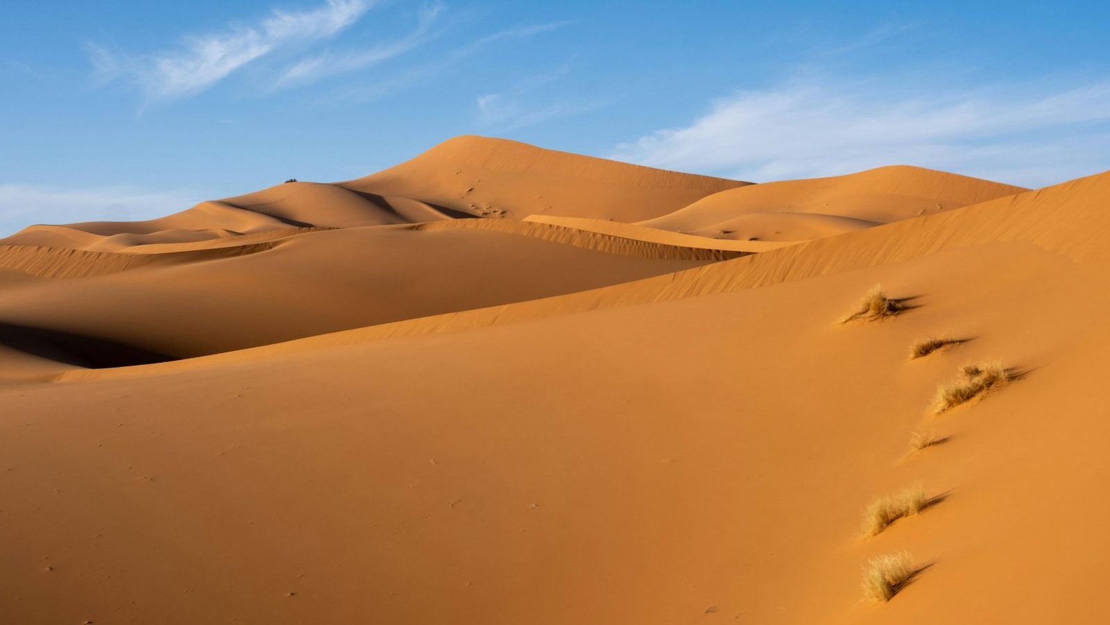 Rondreis Marokko, Erg Chegaga, woestijnen met de zon erop